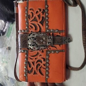 Orange cowgirl buckle wrist wallet‎